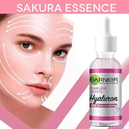 Sakura Facial Essence bottle with hyaluronic acid, designed for skin elasticity and rejuvenation, next to a woman's face with skincare guide lines.