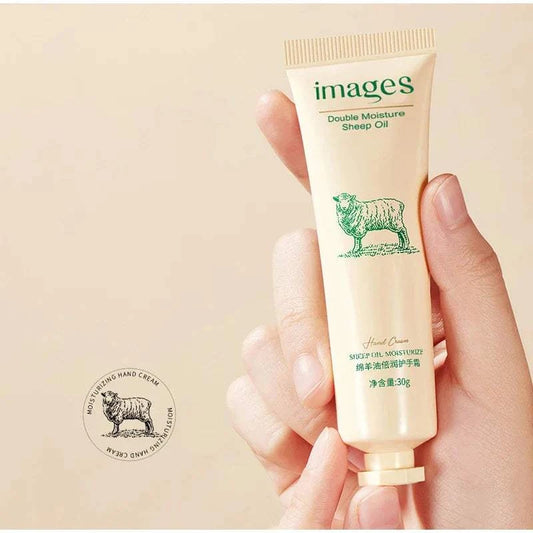 Lanolin Hand Cream tube held in hands, featuring sheep oil double moisture formula.